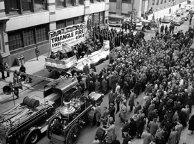 A crowd gathers at the Asch Building for the 50th anniversary of the fire